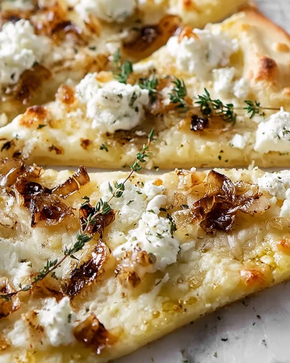 This close-up image shows a flatbread pizza on a white marbled surface, topped with several layers. The base is a thin, golden-baked dough with slightly crispy edges. It is covered with a layer of melted white cheese that looks creamy and stretchy. Scattered evenly on top are small pieces of browned, slightly charred garlic or shallots, adding a textured and caramelized look. There are dollops of soft white cheese, possibly ricotta, spread across the pizza. A small sprig of fresh green thyme sits delicately on one side, adding a touch of color and freshness. photo taken with an iphone --ar 4:5 --v 7