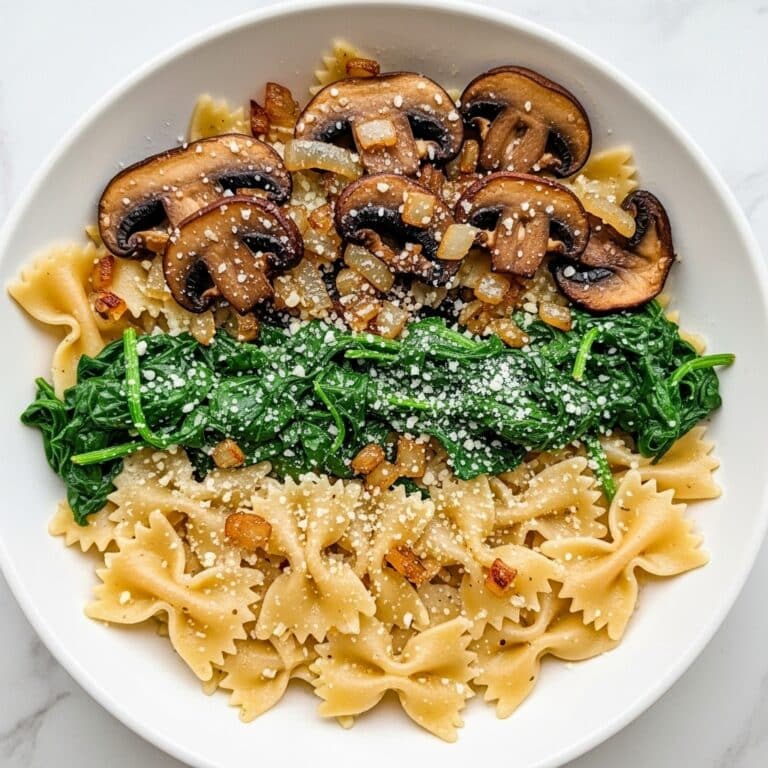 Farfalle Pasta with Spinach, Mushrooms, and Caramelized Onions Recipe